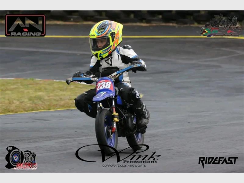 Youngster overcomes wet conditions and two falls to claim top honours.