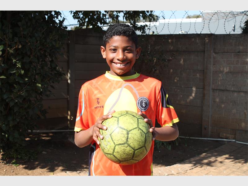 With talent, discipline and a strong support system, the 11-year-old's football future is looking bright.