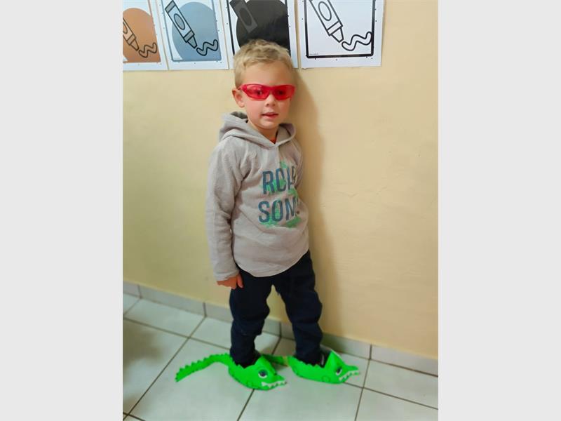 The learners came to school for the last day of the term wearing silly shoes.