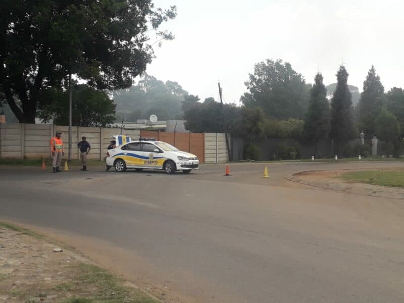 While the road was closed and vehicles redirected, the surrounding area remained calm.