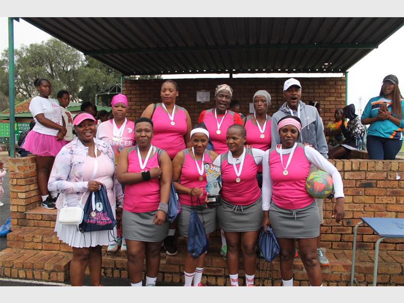 Rain was no deterrent for these legends teams as they battled it out on the netball courts.