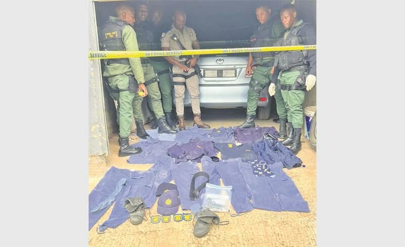 Hijacked car found in Tsakani yard; police uniform items seized.