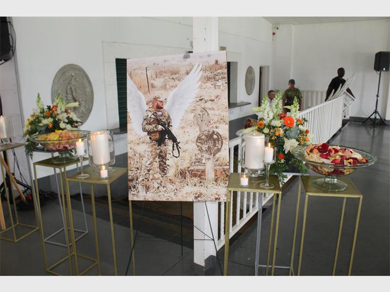 An emotional memorial service was held for Marius van der Merwe, who was gunned down outside his home earlier this month.