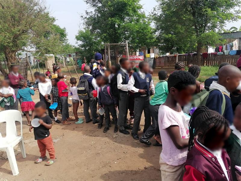 Meals, prayer and kindness were shared with children during a Village of Hope visit to the Mgongo informal settlement.