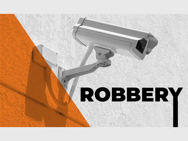 Two robbers fled a petrol station with money, chocolates, and an airtime machine after threatening a cashier.