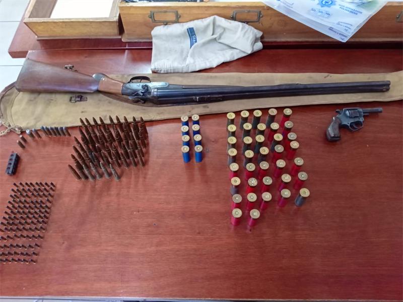 A Minnebron man arrested for domestic violence received two additional charges for possession of an unlicensed firearm.