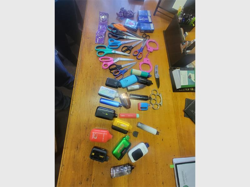 Brakpan SAPS conducted a school search led by Constable Audrey Buthelezi, highlighting ongoing efforts to remove dangerous and prohibited items from classrooms.