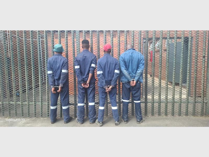 The four men were arrested after officers discovered 20 pieces of copper cable in their vehicle.