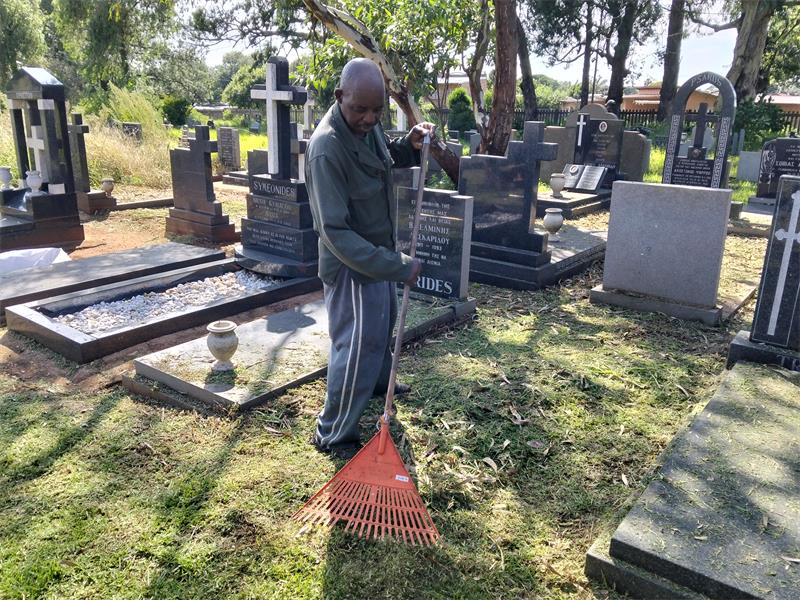 The church's gardener spent every Sunday for a month working at the cemetery to get the Greek section in order.