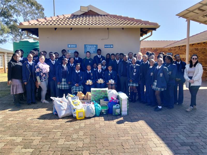 The children in the home's care received a meal, sweets packet and love and attention from learners, while the home received cleaning supplies and toiletries.