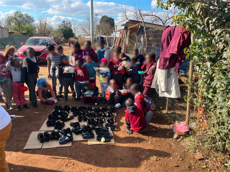 Village of Hope’s Walk a Mile Drive saw families receive clothing and children receive school shoes, food and party packs.