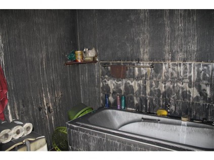 The aftermath of the fire in the bathroom.