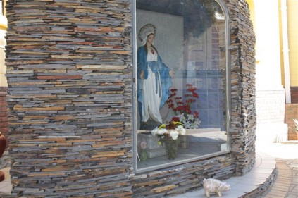 The statue in the outside garden.