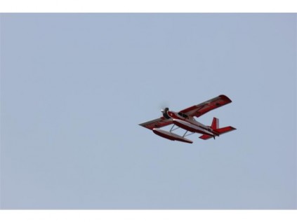 One of the airplanes being flown over the dam.