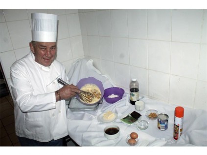 Graham Lundie, chef at Stable Inn is mixing the versatile pudding. The ingredients to bake it are set out.