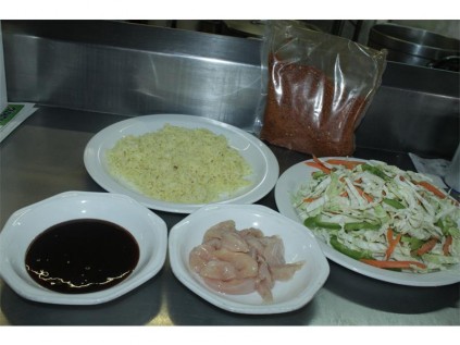 The ingredients of the Pink Panther Roadhouse's stir fry consist of chicken strips, rice, Portugese chicken spice and a mixture of soy sauce and barbecue sauces.