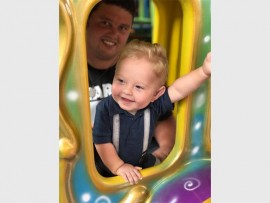 "It is fun to celebrate your first birthday party." Wayne Willemse (left) with his son Caylum, who recently turned one.