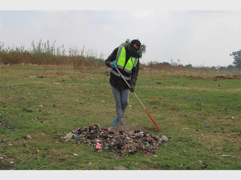 In a bid to raise awareness on community responsibility and health, Bakerton Pharmacy employees cleaned up a local dumping site.
