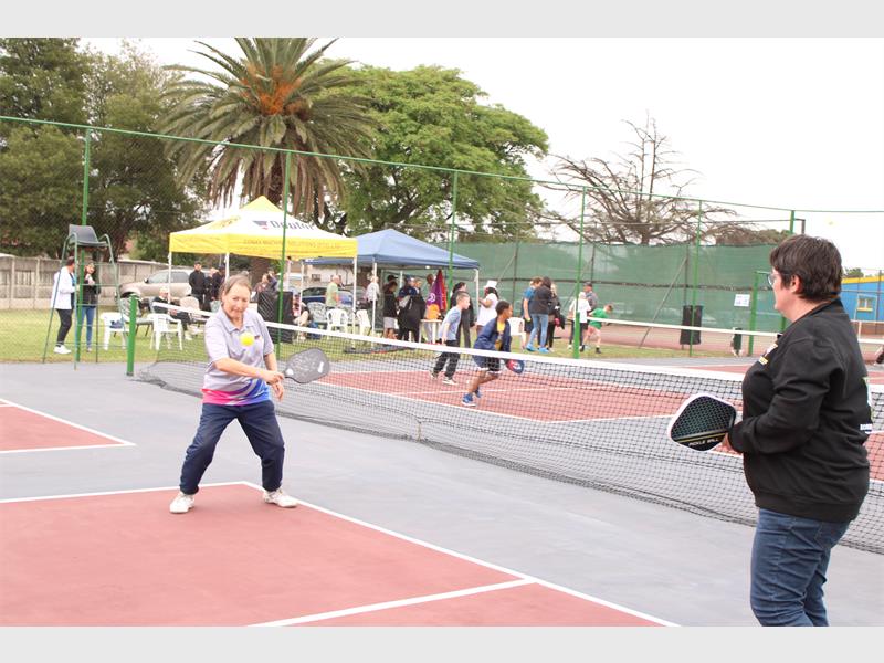 Residents and visitors gathered at the Selection Park Tennis Club for the opening of new pickleball courts. Locals and newcomers to the sport enjoyed learning the fast-growing game, praised for being affordable and social.