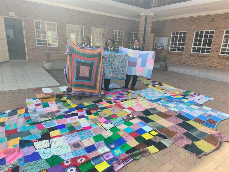 Learners and the community are coming together to crochet 75 blankets for vulnerable residents.