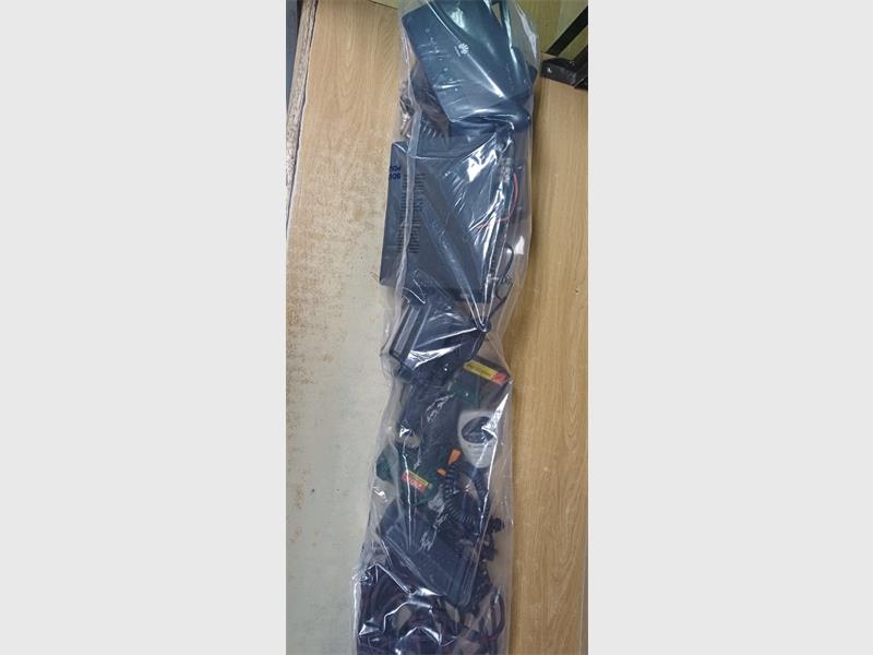 A man was arrested after police allegedly found a firearm and various suspected stolen items in his possession on Park Avenue.