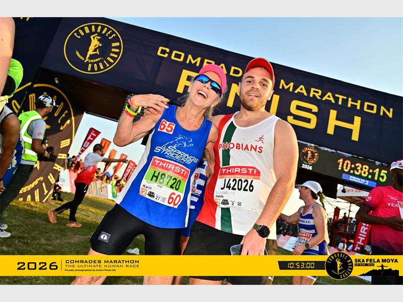 Springs Striders runner Karin Smith completed her 28th Comrades Marathon at the age of 67, sharing a memorable finish with her son, Janis.