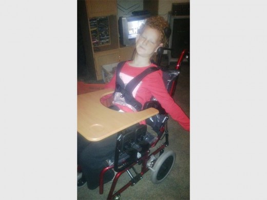Nikita Hofman in her brand new wheelchair bought with funds raised by the Randfontein CPF. Photo: Submitted. (WEB ONLY)