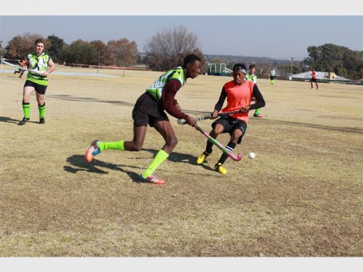 Thamsanga Dube from HOH, after jinking his ball past a RHC player.