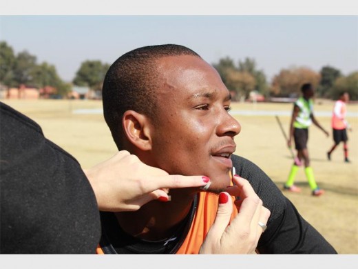 Shady Nchabeleng getting butterfly closures on his gashed chin during the match. The club's 2016 successes did not come without injury. File photo/ Roxy de Villiers