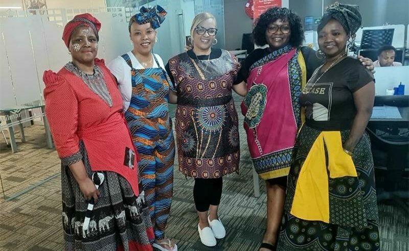 To celebrate Heritage Day and their individual cultures, a group of women wore their traditional attire to work and shared some characteristics of their culture.