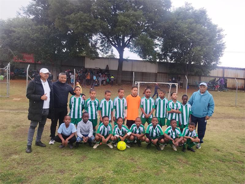 The John Adams Foundation's U11 soccer team not only won the recent Knockout Cup Finals but also celebrated their second-place finish in the Bosmont Football Association.