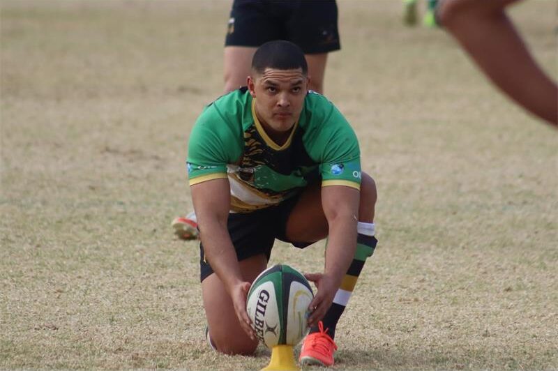 Randfontein Rugby Club's first team booked its place in the Grand Challenge semi-finals with a 36–26 victory over Wits and their eightman scoring a hat-trick.