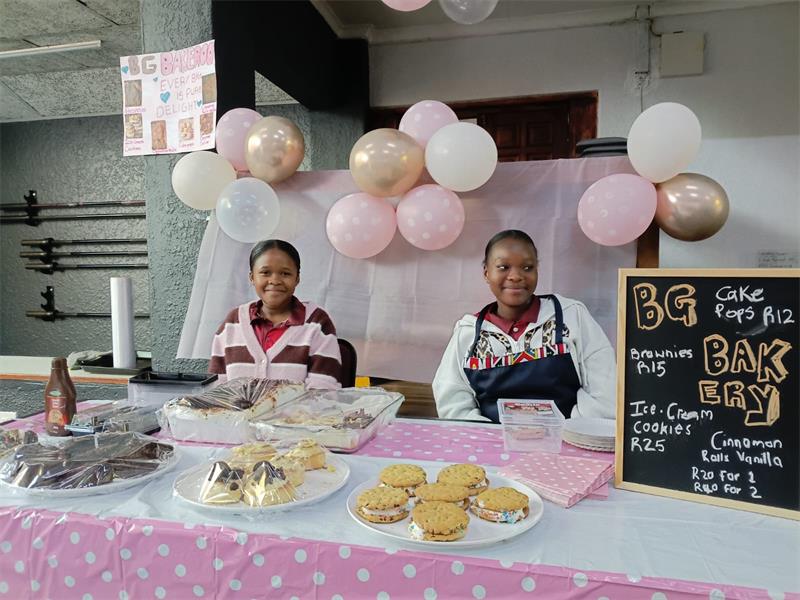 Colourful stalls, tempting treats and fun games gave learners a taste of what it takes to run a small business.