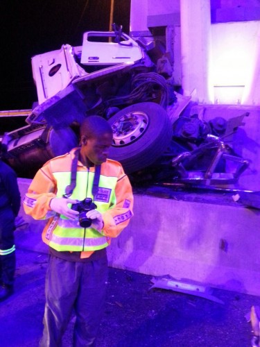 THREE people were killed when this truck collided with an e-toll bridge pillar on the R21. PHOTOGRAPH: NETCARE 911