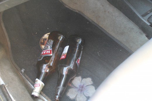 OPEN alcohol bottles found in the car