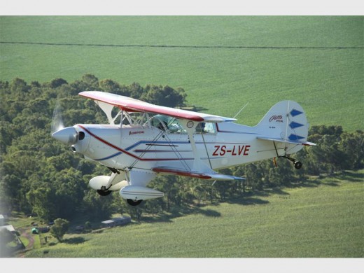 VAN Der Schaar flying his Pitts Special Aircraft S-2A over the Petiti Airfield.