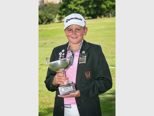 CASEY Jarvis from State Mines Golf Club holds the trophy presented to him as the new SA U/13 stroke play champion.