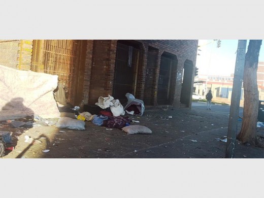 CORNER Long Street and Monument Road: vagrants removed and belongings about to be loaded into a metro police van. Photograph: EMPD