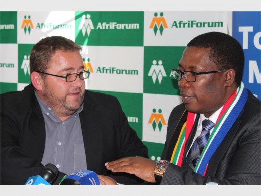 GAUTENG Education MEC Panyaza Lesufi reassured AfriForum's Kallie Kriel that Afrikaans would not be erased from the education system.