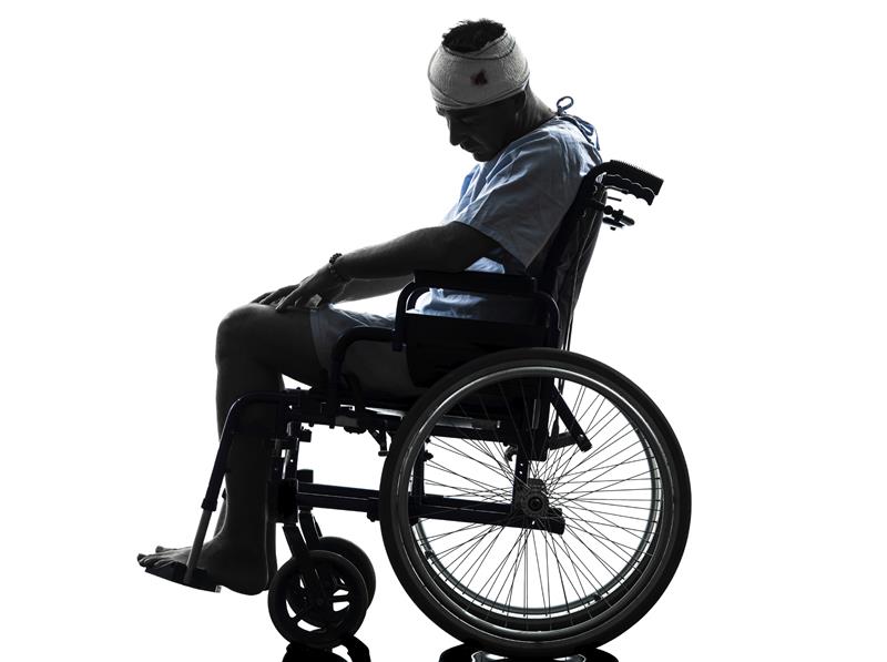 one  injured man in wheelchair sleeping in silhouette studio  on white background