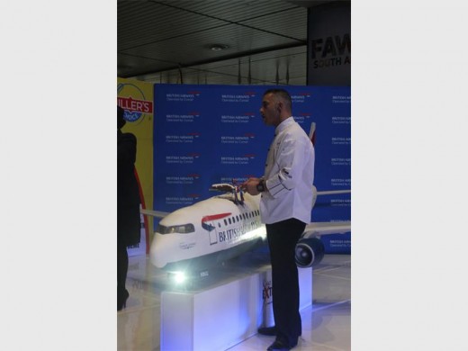 PAUL Vieira starts to slice the cake he engineered for weeks.
