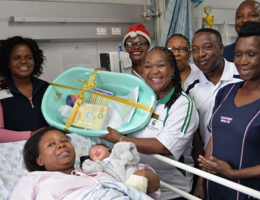 City of Ekurhuleni officials and Bertha Gxowa Hospital nursing staff in Germiston celebrate with new mom, Dorcas Nelson who gave birth to baby Sandile at 2:05am. City of Ekurhuleni showered Dorcas with a gift hamper for the baby.