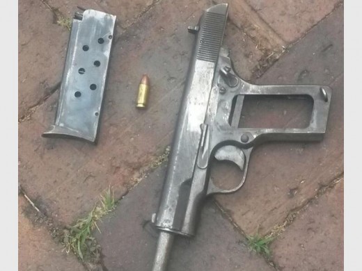 THE unlicensed firearm and bullet found on the suspects. Photograph: Norkem Park SAPS