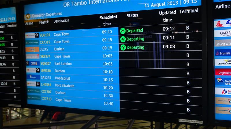 Flight Board at Or Tambo International Airport showing a list of flights leaving and arriving in the country.