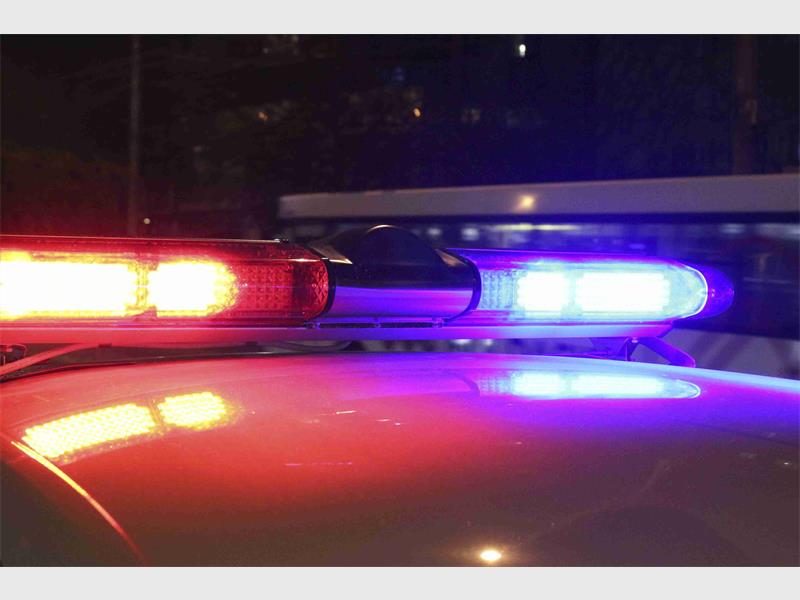Police lights on a police car at night.