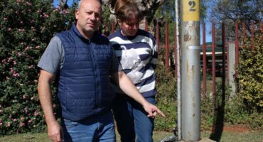 Resident points towards a stolen cable.