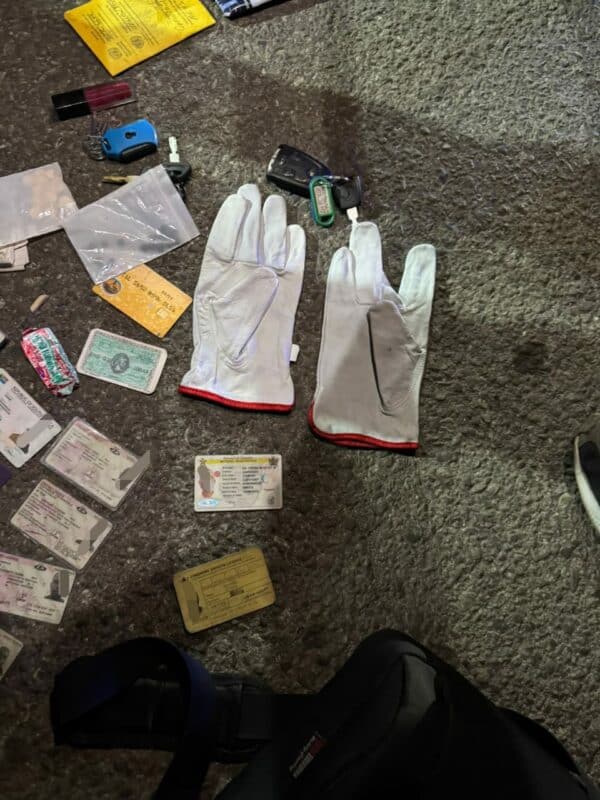 During the operation, officers also confiscated seven vehicle registration plates, six driving licences, three passports, four pairs of gloves, three reflective jackets, three work suits, four different car keys, and two SAPS dockets believed to have been unlawfully obtained. Photo: EMPD.