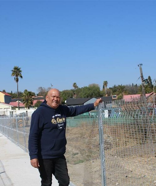 The bridge will provide a safe crossing for school children and residents who previously risked their safety navigating the water stream during heavy rains.