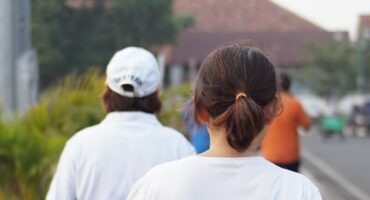 Members of the community walking in the streets.