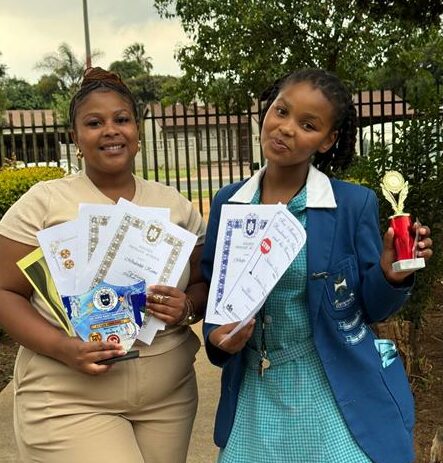 Head Girl wins spelling competition.